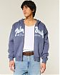 Moscow USA предлагает Вам купить мужскую толстовку на молнии с капюшоном Hollister синего цвета с логотипом нашитым. Оригинальная модель, бесплатная доставка и примерка по России.