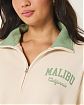 Женская толстовка свитшот Hollister Malibu California бежевого цвета с графикой на груди и спине. Модель 07514. Бесплатная доставка по России, Москве и Области от Moscow USA