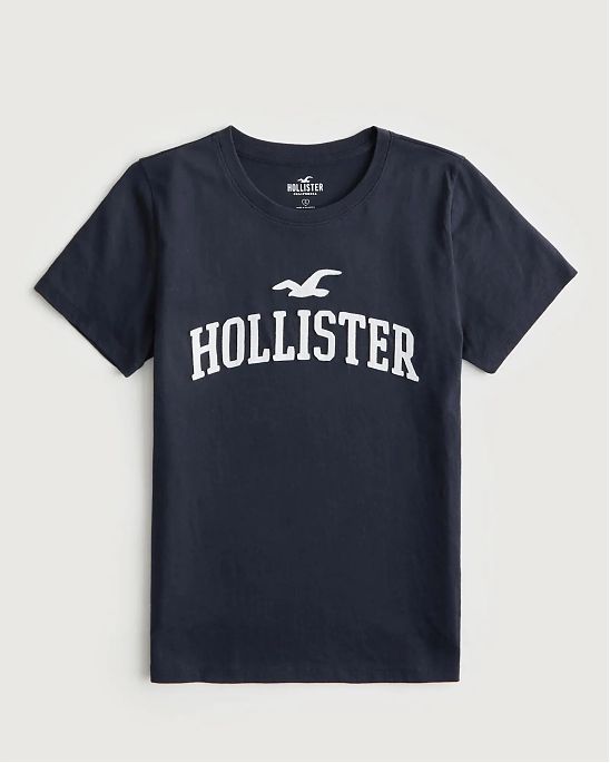 Женская футболка Hollister темно-синего цвета с фирменным нашитым белым логотипом. Модель 06526. Подробное описание и цена товара. Доставка по России, Москве и Области от Moscow USA
