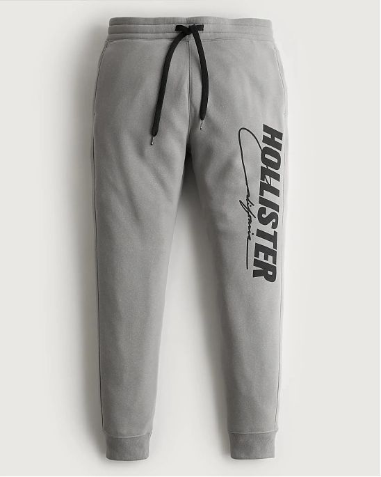 Moscow USA предлагает Вам купить спортивные штаны Hollister Joggers серого цвета с черным принтом. Модель 06479. Доставка по России, Москве и области, самовывоз.