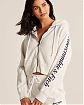 Женская толстовка на молнии с капюшоном Abercrombie Fitch светло серого цвета с надписями на рукавах. Модель 05018. Подробное описание и цена товара. Доставка по России, Москве и Области от Moscow USA
