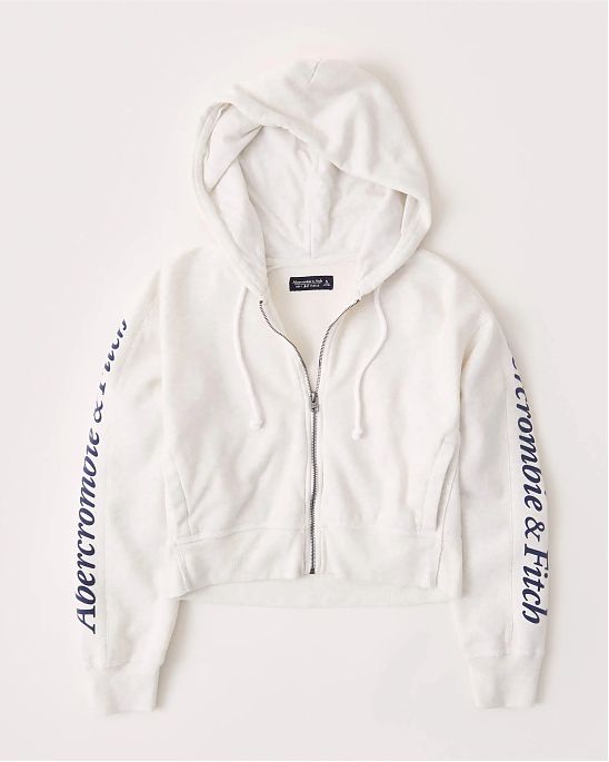 Женская толстовка на молнии с капюшоном Abercrombie Fitch светло серого цвета с надписями на рукавах. Модель 05018. Подробное описание и цена товара. Доставка по России, Москве и Области от Moscow USA