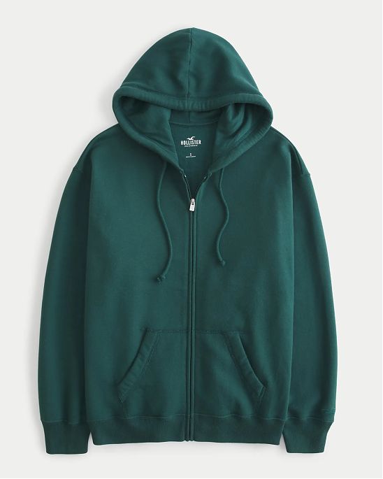 Женская толстовка на молнии с капюшоном Hollister Oversized Feel Good Oversized темно-зеленого цвета. Модель 06975. Подробное описание и цена товара. Доставка по России, Москве и Области от Moscow USA