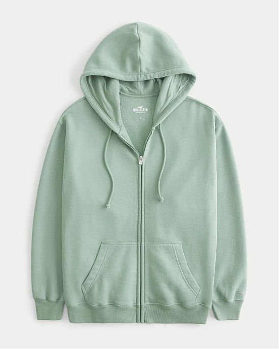 Женская толстовка на молнии с капюшоном Hollister Oversized Feel Good Oversized светло-зеленого цвета. Модель 07119. Подробное описание и цена товара. Доставка по России, Москве и Области от Moscow USA