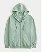 Женская толстовка на молнии с капюшоном Hollister Oversized Feel Good Oversized светло-зеленого цвета. Модель 07119. Подробное описание и цена товара. Доставка по России, Москве и Области от Moscow USA