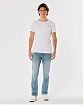 Moscow USA предлагает вам купить джинсы Hollister Slim Straight Jeans синего цвета с небольшими потертостями. Модель 06943. Доставка по России, Москве и области, самовывоз.