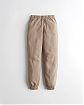Женские спортивные штаны Hollister Dad Joggers светло-коричневого цвета с нашитым логотипом в виде чайки. Модель 06059. Подробное описание и цена товара. Доставка по России, Москве и Области от Moscow USA
