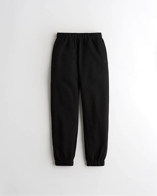 Женские спортивные штаны Hollister Dad Joggers черного цвета с нашитым логотипом в виде чайки. Модель 06044. Подробное описание и цена товара. Доставка по России, Москве и Области от Moscow USA