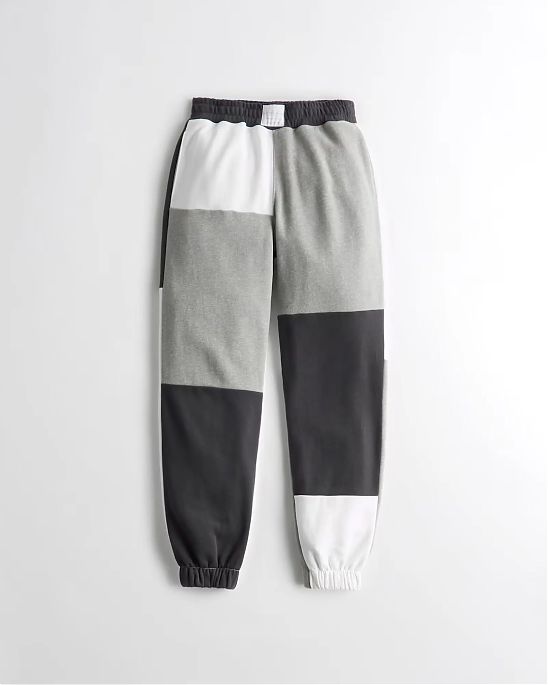 Женские спортивные штаны Hollister Dad  joggers бело-серо-черного цвета. Модель 06539. Подробное описание и цена товара. Доставка по России, Москве и Области от Moscow USA