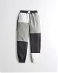 Женские спортивные штаны Hollister Dad  joggers бело-серо-черного цвета. Модель 06539. Подробное описание и цена товара. Доставка по России, Москве и Области от Moscow USA