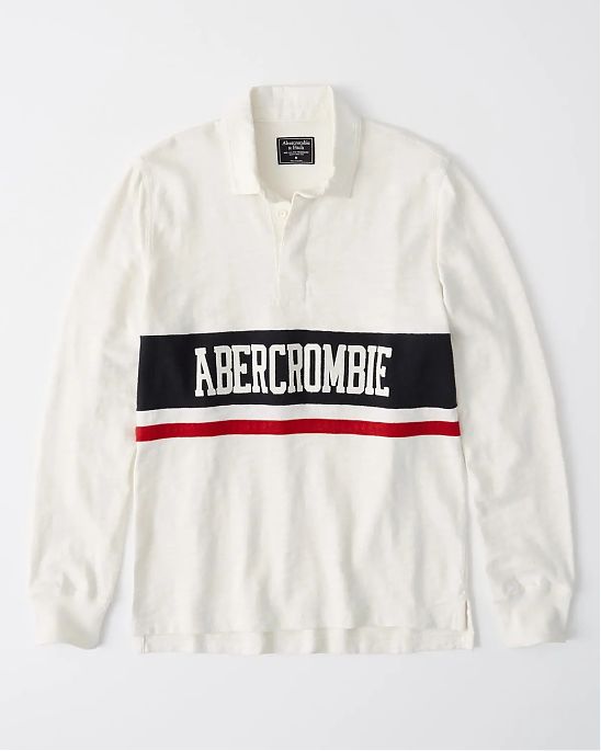 Moscow USA предлагает вам купить поло с длинным рукавом Abercrombie Fitch белого цвета с темно-синей и красной полосками с нашитыми белыми надписями. Модель 04209. Доставка по России, Москве и области, самовывоз.