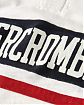 Moscow USA предлагает вам купить поло с длинным рукавом Abercrombie Fitch белого цвета с темно-синей и красной полосками с нашитыми белыми надписями. Модель 04209. Доставка по России, Москве и области, самовывоз.