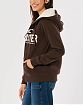 Женская меховая толстовка на молнии и с капюшоном Hollister коричневого цвета с белой нашитой надписью. Модель 06531. Подробное описание и цена товара. Доставка по России, Москве и Области от Moscow USA