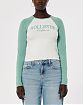 Женская футболка Hollister белого цвета с зелеными рукавами и графикой. Модель 06597. Доставка по России, Москве и Области от Moscow USA