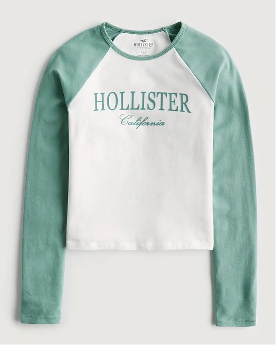 Женская футболка Hollister белого цвета с зелеными рукавами и графикой. Модель 06597. Доставка по России, Москве и Области от Moscow USA
