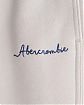 Moscow USA предлагает Вам купить спортивные повседневные штаны Abercrombie Fitch светло-серого цвета с нашитым синим логотипом. Модель 06993. Доставка по России, Москве и области, самовывоз.