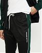 Moscow USA предлагает Вам купить спортивные классические штаны Abercrombie Fitch Joggers черного цвета с зелеными полосками и белой надписью. Модель 04608. Доставка по России, Москве и области, самовывоз.